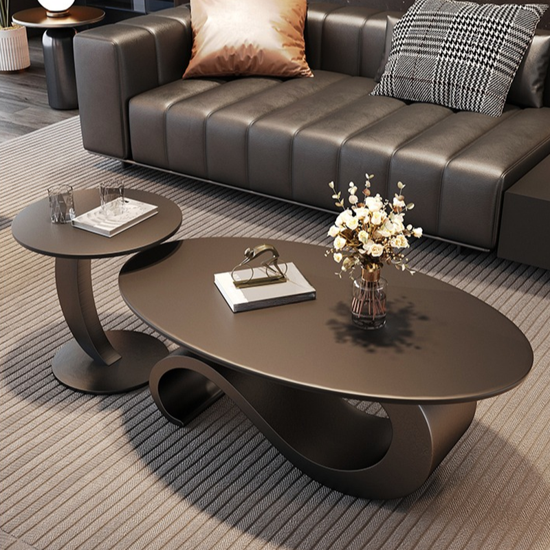 Minimalist Elliptical Rock Nesting Accent Table with Abstract Base - image 3