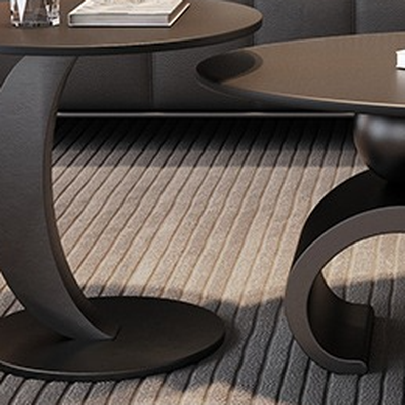 Minimalist Elliptical Rock Nesting Accent Table with Abstract Base - image 8