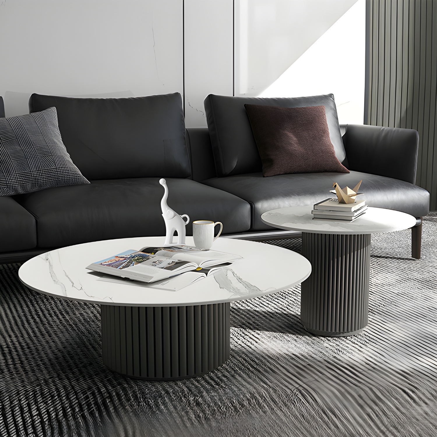 Set of Two Modern Round Black Coffee Tables with White Stone Tops and Iron Pedestal Bases